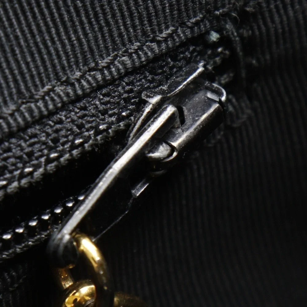 CHANEL Black Caviar Leather Bag